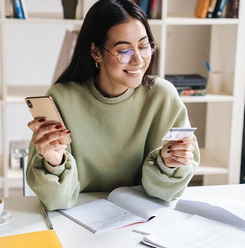 Woman using a credit card