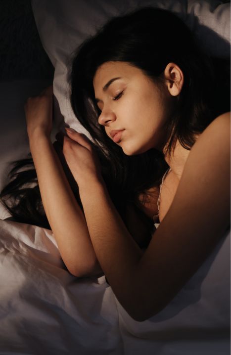 Woman sleeping soundly on her side