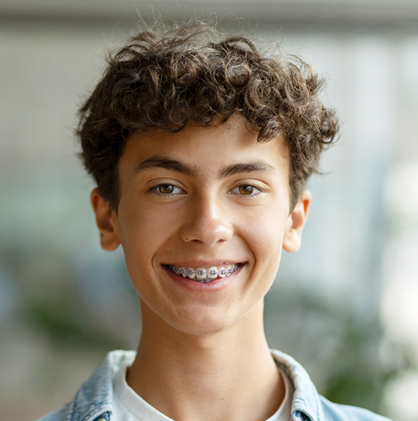 Smiling teenage boy with braces